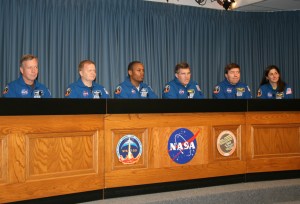 IMG_9040a_STS 133_Ken Kremer Discovery Crew at Post-Landing News Conference